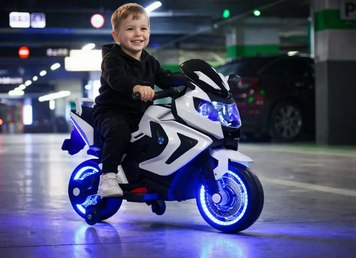 Дитячий електромотоцикл білий, 12V, 2 мотори, LED підсвітка, музика, до 20 кг, електромотоцикл для дітей MOTO 10 фото